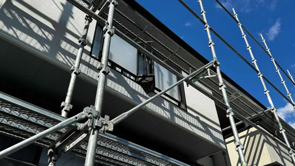 Scaffold bracing installed alongside a building as part of the scaffold stability system