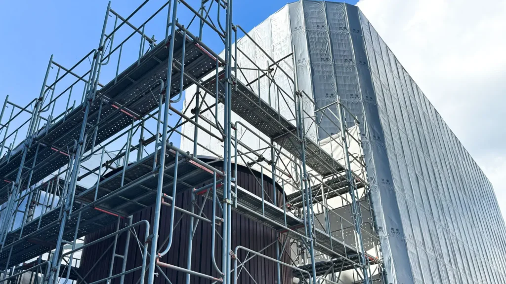 Scaffold structure showing platforms, frames and site conditions that must be coordinated after drawing revisions