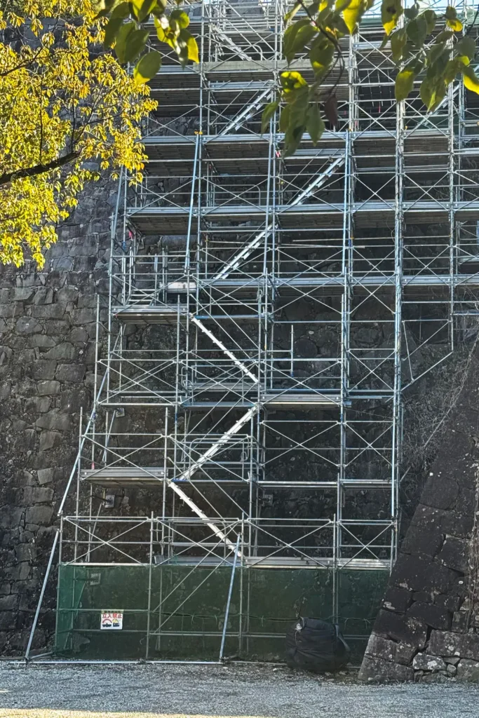 Scaffold stair access connecting multiple working levels on a tall scaffold structure